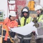 Civil Engineers At Construction Site In Winter